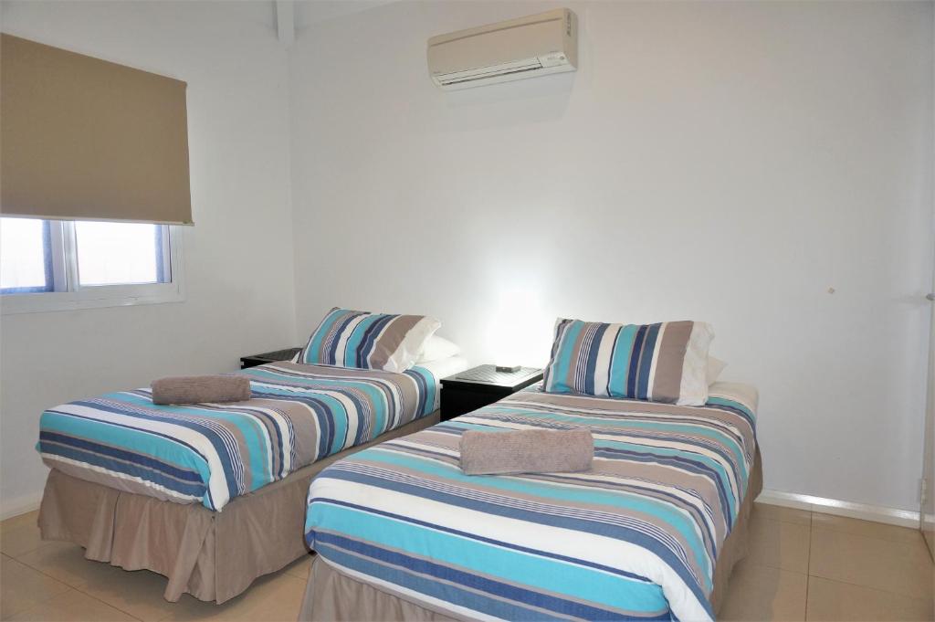 Osprey Holiday Village Unit 104 Luxurious 3 Bedroom Holiday Villa With A Pool In The Complex - thumb 2